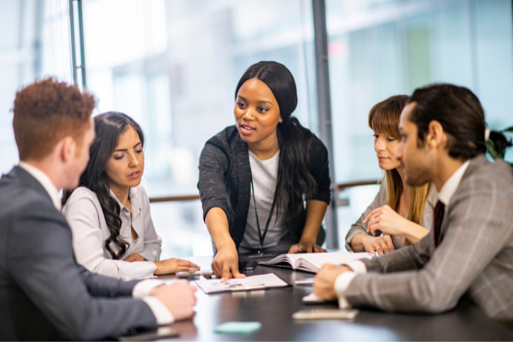 Diverse professionals discussing leadership values