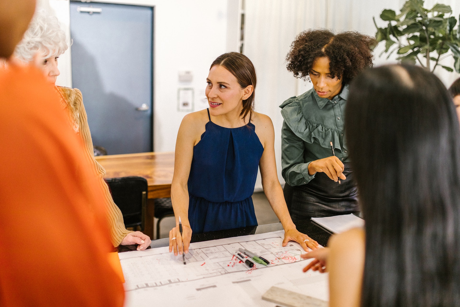 Woman colleagues meeting to discuss employee sentiment